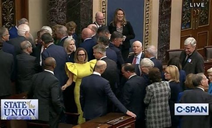 
“Desperate for attention”: Sen. Kyrsten Sinema trolled for bright yellow dress worn at State of the Union address 
