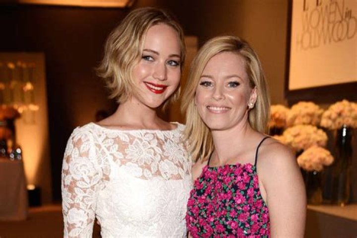 
Elizabeth Banks Says Jennifer Lawrence Stuck a Fan up Her Dress During ‘Hunger Games’ to Cool Her Off 