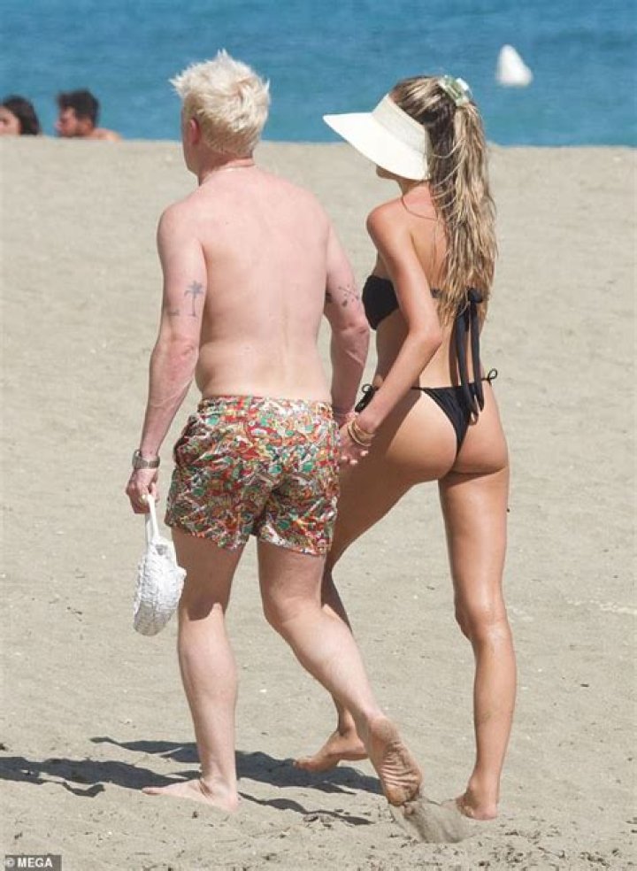 
Eugenie Bouchard Dazzles In Bikini As She Hits The Beach With A Mystery Boyfriend 