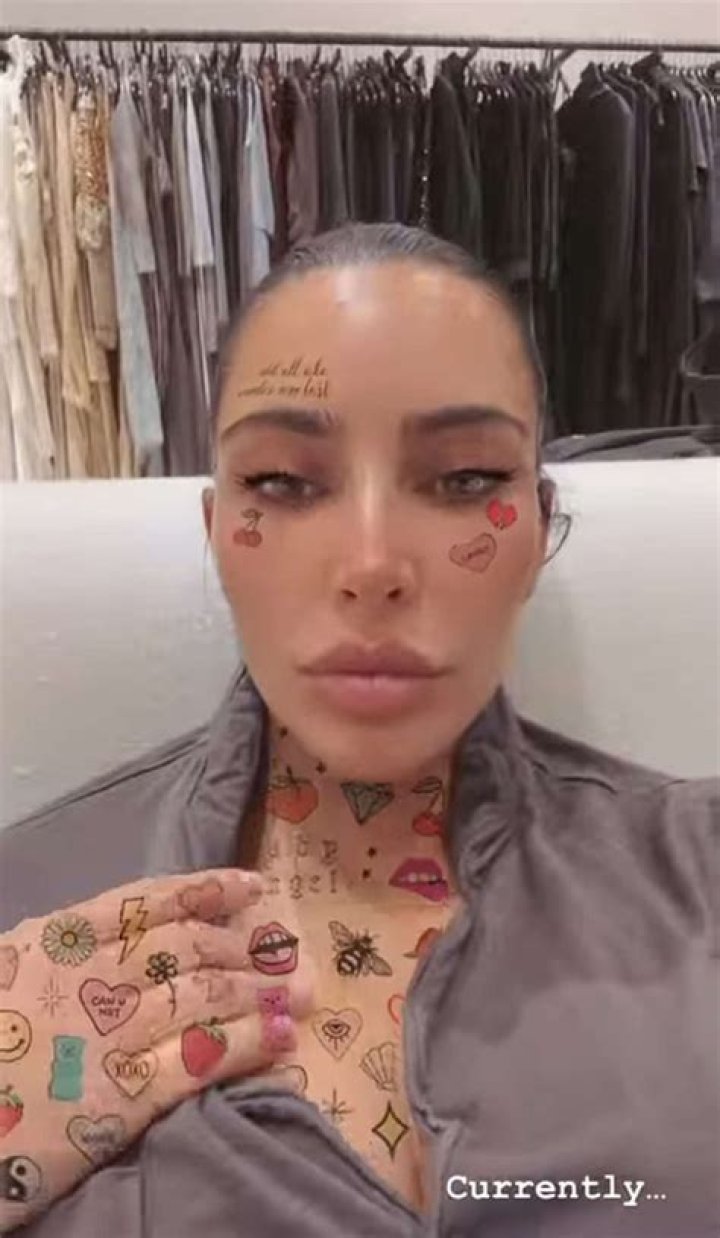 
Kim Kardashian Transforms into Tattooed Lady Using Phone Filter 