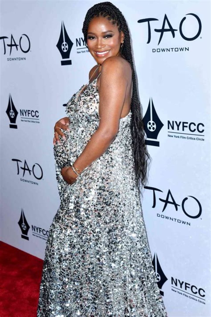 
Pregnant Keke Palmer Cradles Her Growing Baby Bump in Sparkling Silver Gown — See the Look! 